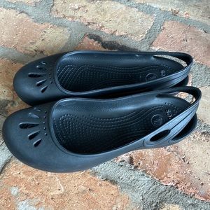 Crocs black slip on shoes, size 7